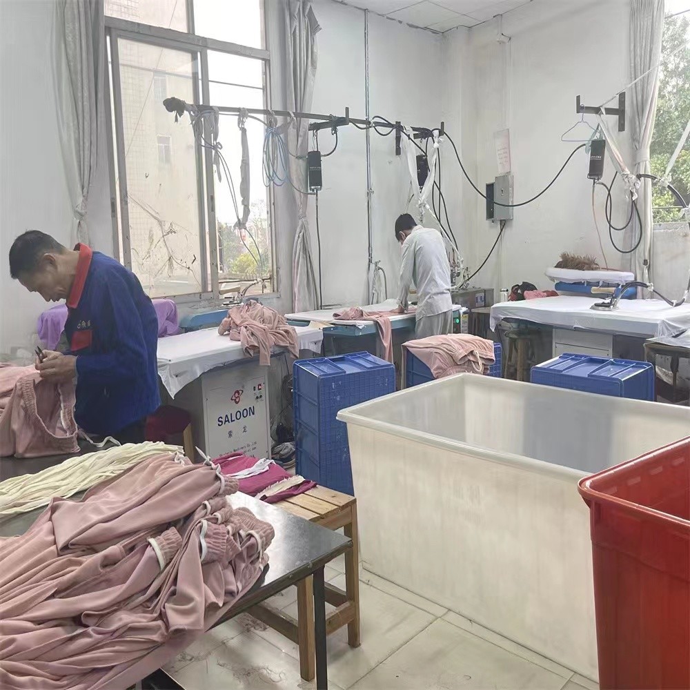Guangzhou Vinas clothing technology Co., LTD fabriek productielijn