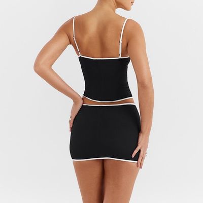 Custom nieuwe kleur contrast holle halter rok twee-stuk mode pak